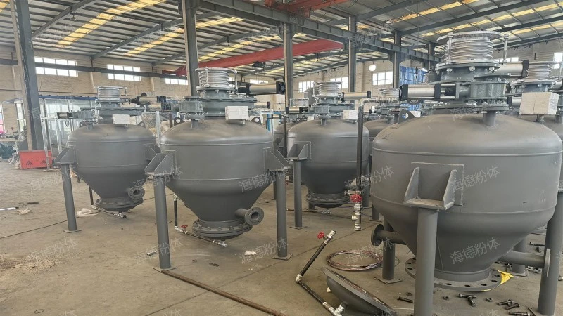 Upward blowing pneumatic ash conveying bin pump